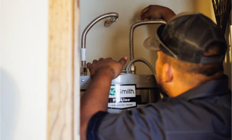 plumbing tech working