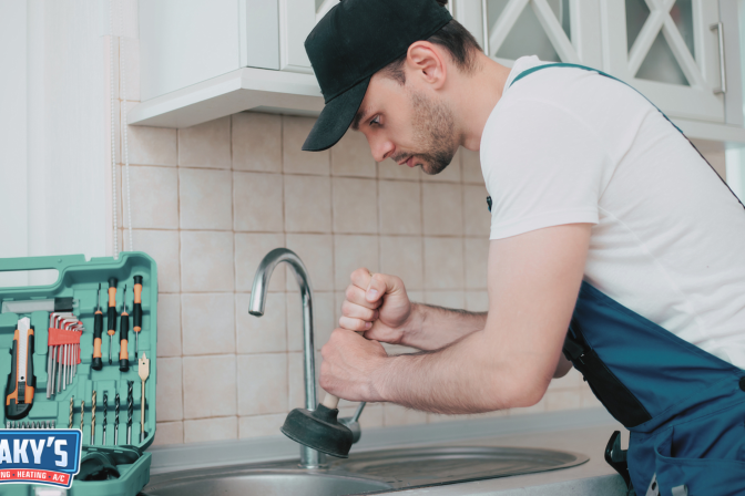 How to unclog a drain:  Plunger vs. snake